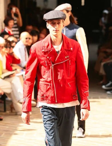 Stylish model wearing Junya Watanabe streetwear featuring an oversized jacket, relaxed fit pants, and modern sneakers, showcasing the latest fashion styles and streetwear trends for 2026.